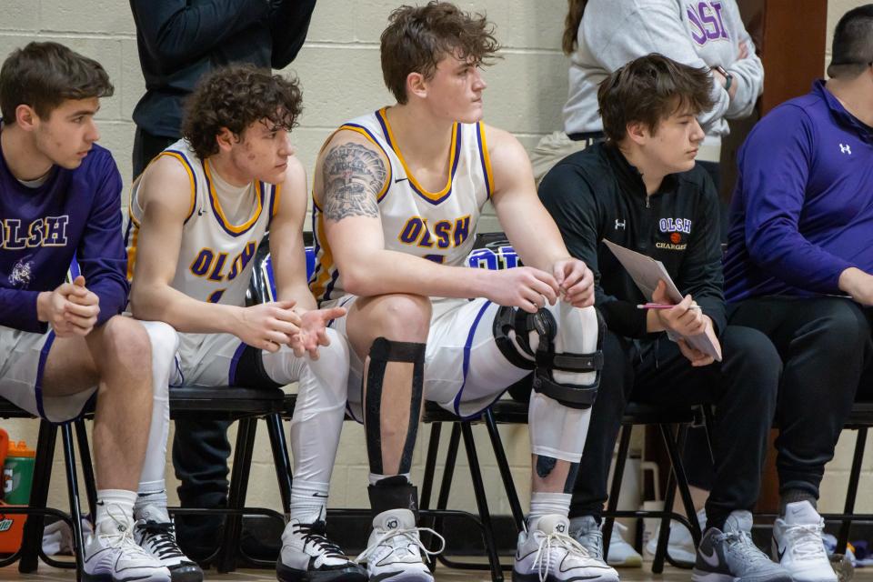 Vann Kavals looks onward as he sits on the bench during the second half of OLSH’s game against South Park on Jan. 9, 2024.