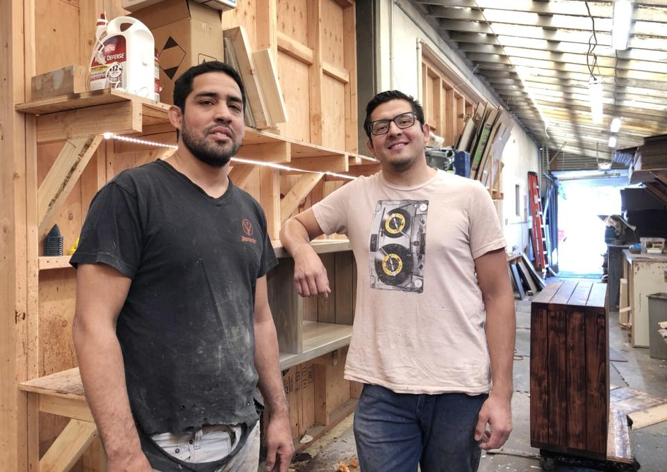 David Jauregui, left, and Fabian Guzman, at Ocean Beach Pallet Co.