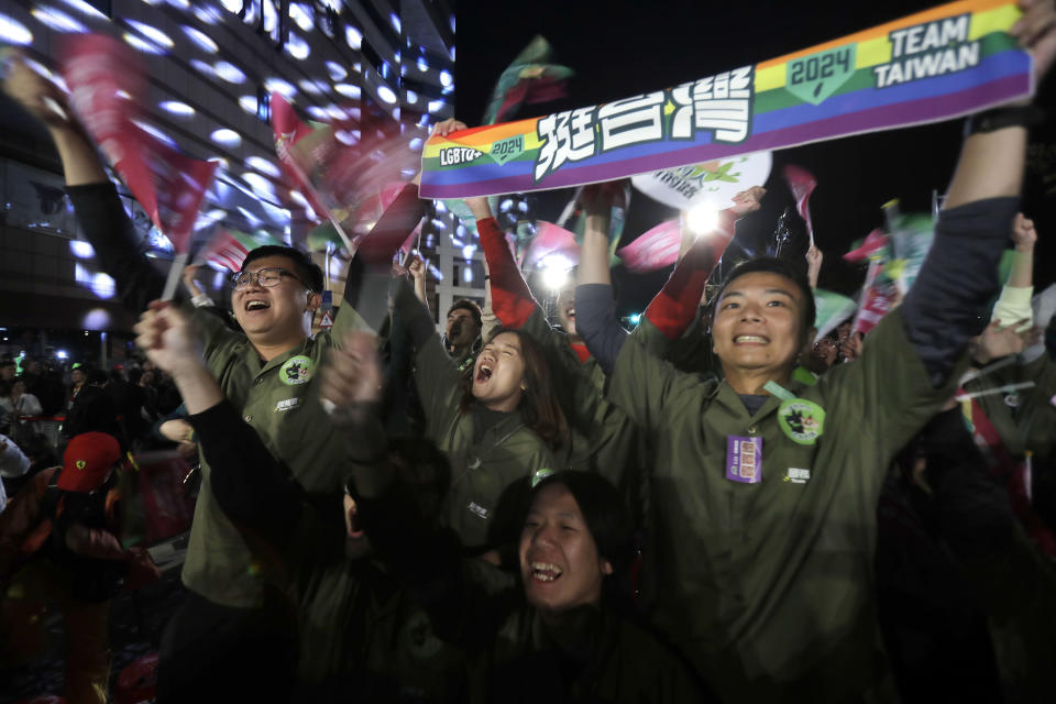 Supporters of Taiwan's 2024 presidential election candidate, Taiwan vice president Lai Ching-te, also known as William Lai, cheer after Lai's victory, in Taipei, Taiwan, Saturday, Jan. 13, 2024. Ruling-party candidate Lai Ching-te has emerged victorious in Taiwan's presidential election and his opponents have conceded. The result in Taiwan's presidential and parliamentary election will chart the trajectory of relations with China over the next four years. (AP Photo/Chiang Ying-ying)