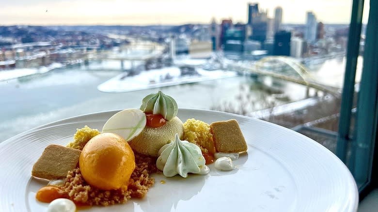 Altius dessert against city backdrop