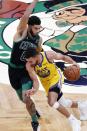 Golden State Warriors' Stephen Curry (30) drives past Boston Celtics' Jayson Tatum (0) during the second half of an NBA basketball game, Saturday, April 17, 2021, in Boston. (AP Photo/Michael Dwyer)