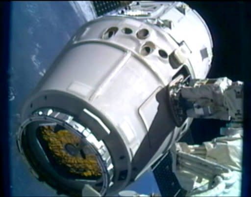 This frame grab from a NASA video shows SpaceX's Dragon cargo ship berthed to an ISS port on May 25. The Dragon cargo ship is preparing to make its return journey to Earth after a landmark mission to the ISS, NASA and SpaceX said