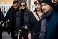 <p>In a denim jacket and very shiny pants while out in Milan with her sister, Bella Hadid.</p>