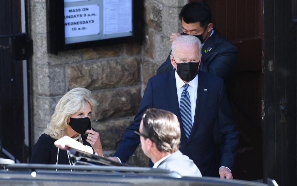 President Joe Biden and First Lady Jill Biden leaving church after attending mass in St Ives, Cornwall - AFP