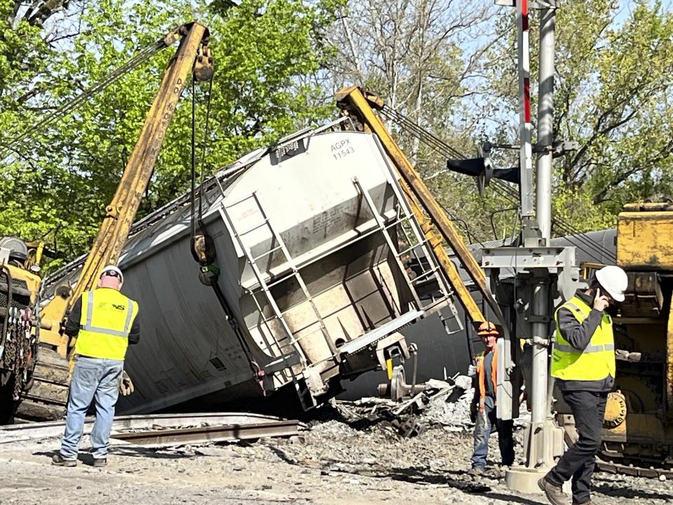 FILE - A crew works to recover a train after a derailment outside New Castle, Pa., on May 11, 2023. The Federal Railroad Administration recently completed a review of Norfolk Southern's safety culture done in the wake of the fiery Feb. 3 derailment in Ohio, and officials plan to follow up with similar investigations of all the major freight railroads over the next year. (Lucy Schaly/Pittsburgh Post-Gazette via AP, File)