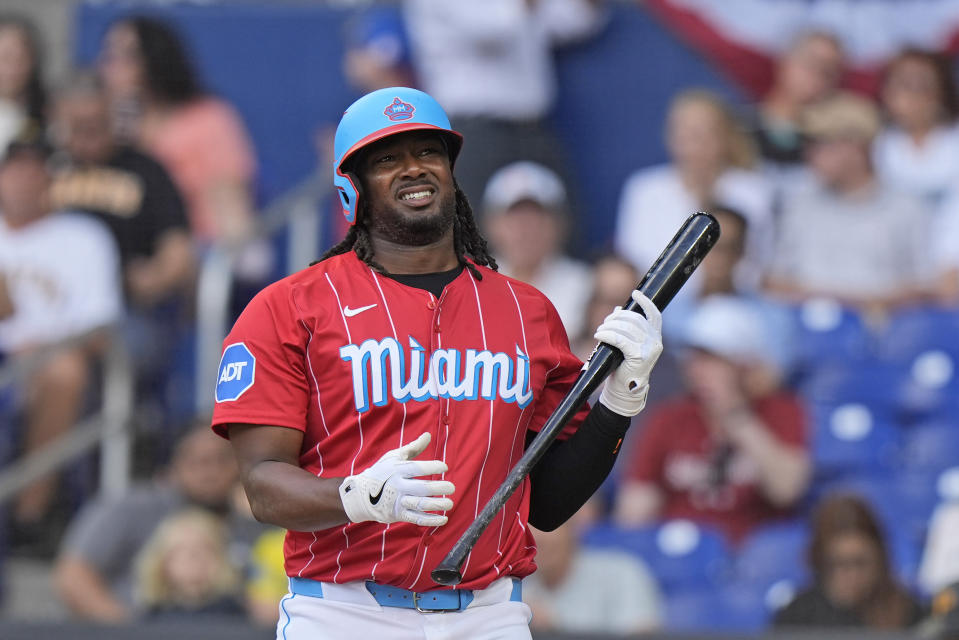 Miami Marlins' Josh Bell reacts to a called strike during the first inning of a baseball game against the Pittsburgh Pirates, Saturday, March 30, 2024, in Miami. (AP Photo/Wilfredo Lee)