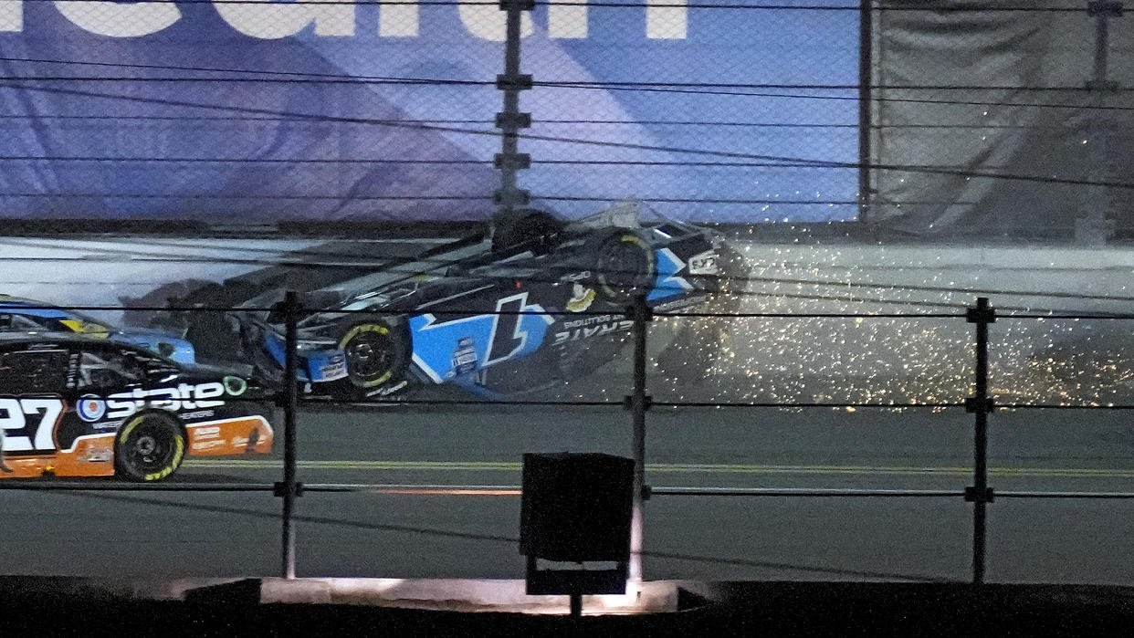 Sam Mayer (1) is upside down after crashing in the last lap during the NASCAR Xfinity Series auto race Saturday, Feb. 18, 2023, at Daytona International Speedway in Daytona Beach, Fla. (AP Photo/Chris O'Meara)