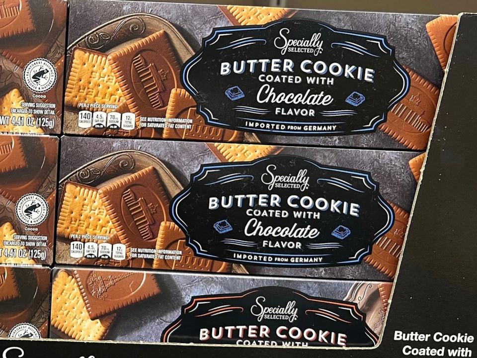 Six boxes of Specially Selected butter cookies with chocolate coatings at Aldi