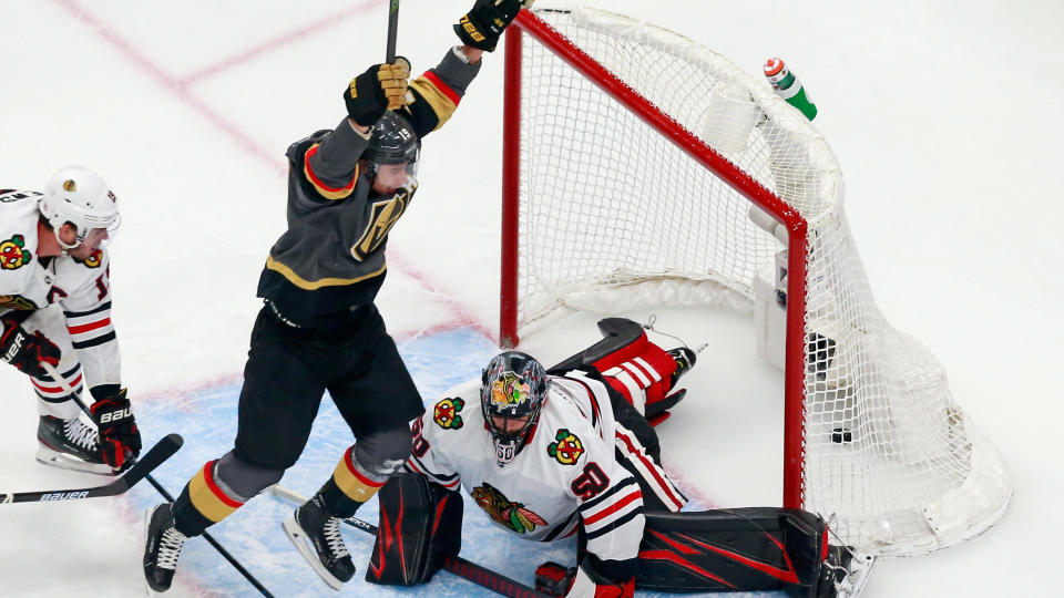 EDMONTON, ALBERTA - AUGUST 13: Reilly Smith #19 of the Vegas Golden Knights scores the game-winning goal at 7:13 of overtime against the Chicago Blackhawks to win the game 4-3 in Game Two of the Western Conference First Round during the 2020 NHL Stanley Cup Playoffs at Rogers Place on August 13, 2020 in Edmonton, Alberta, Canada. (Photo by Jeff Vinnick/Getty Images)