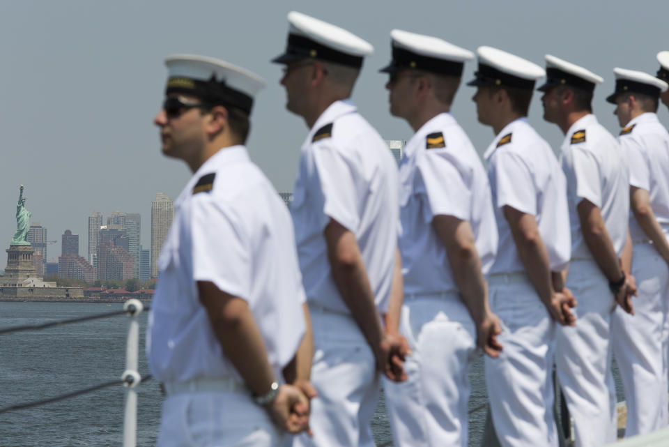 <p>Crew members of Her Majesty Canadian Ship Athabaskan man the rails as they sail past the Statue of Liberty, Wednesday, May 25, 2016, in New York. The annual Fleet Week is bringing a flotilla of activities, including a parade of ships sailing up the Hudson River and docking around the city. The events continue through Memorial Day. (AP Photo/Mary Altaffer) </p>