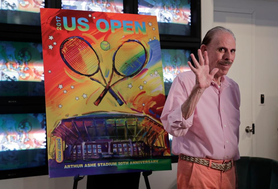 In this June 14, 2017, file photo, artist Peter Max acknowledges applause during the unveiling of the theme art he created for the 2017 U.S. Open tennis tournament in New York.