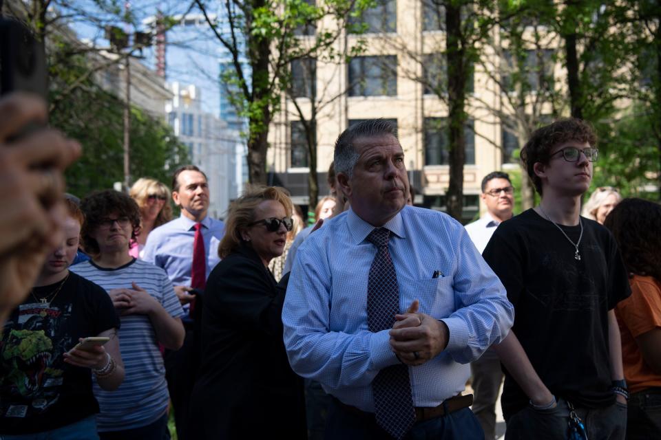 Rep. Bo Mitchell, D-Nashville, stands with Nashville area high school students ahead of their protest against SB1325 and march to the Tennessee Capitol in Nashville, Tenn., Monday, April 15, 2024.