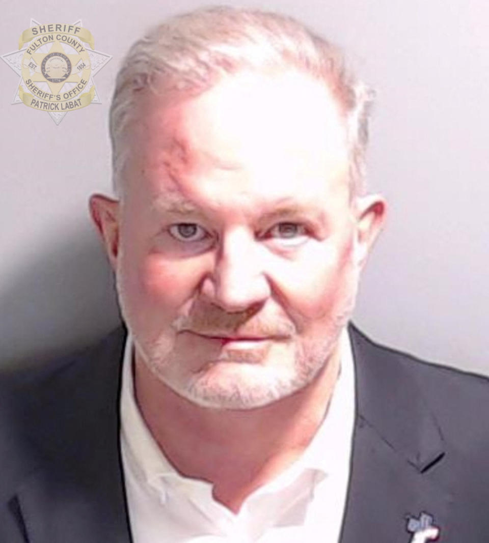 Republican poll watcher Scott Hall is shown in a police booking mugshot released by the Fulton County Sheriff's Office on August 22, 2023. (Fulton County Sheriff's Office)


