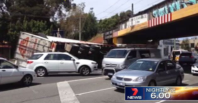 A truck has hit a bridge and tipped over in South Melbourne. Photo: Supplied