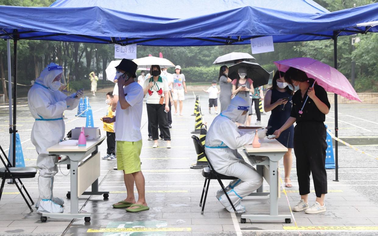 China's zero-Covid policy includes mandatory mass testing - Beijing Youth Daily/ Visual China Group