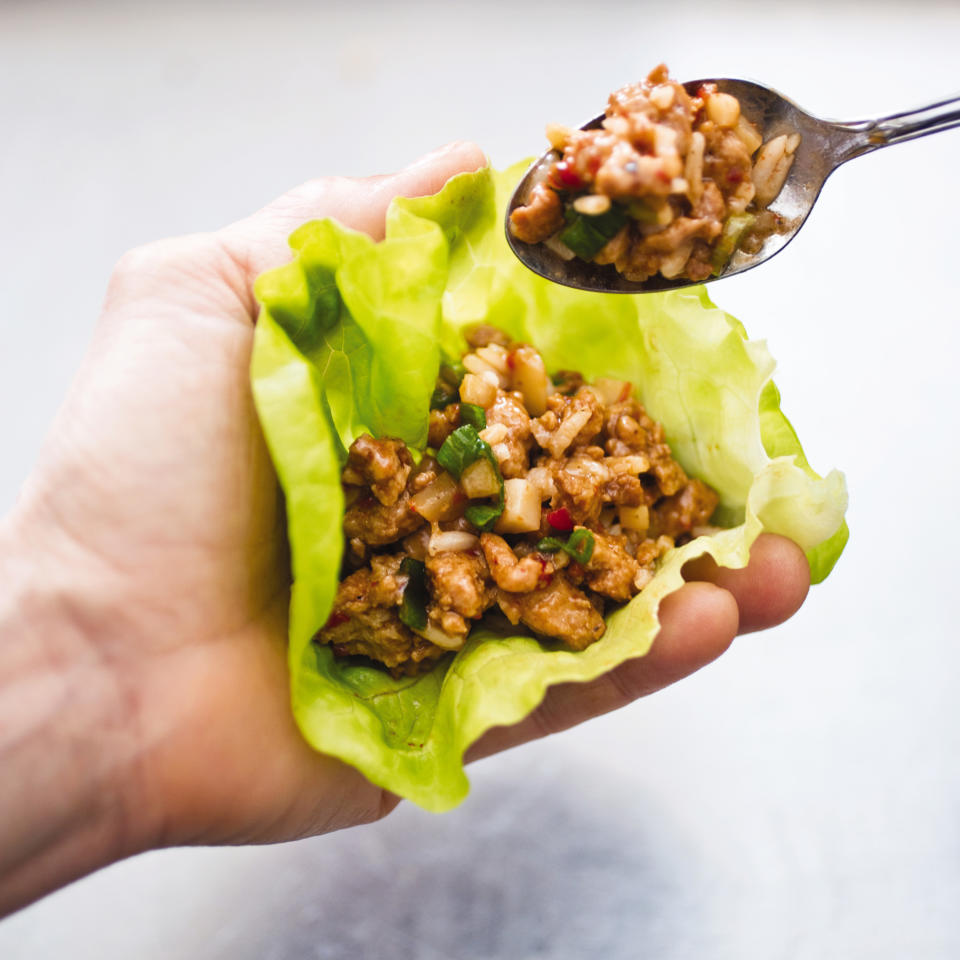 This undated photo provided by America's Test Kitchen in December 2018 shows a Asian Chicken Lettuce Wrap in Brookline, Mass. This recipe appears in the cookbook "Complete Diabetes." (Carl Tremblay/America's Test Kitchen via AP)