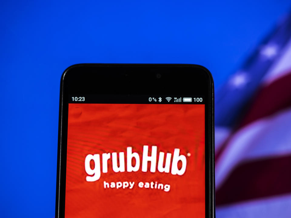KIEV, UKRAINE - 2018/09/16:  In this photo illustration, the GrubHub logo seen displayed on a smartphone. Grubhub Inc. is an on line and mobile food-ordering company that connects diners with local restaurants. Based in Chicago, the company has more than 14 million active diners, and approximately 80,000 restaurant partners in over 1,600 cities across the United States and the United Kingdom. (Photo Illustration by Igor Golovniov/SOPA Images/LightRocket via Getty Images)