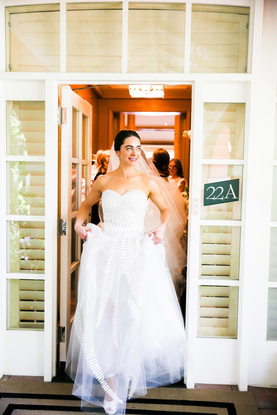 The bride wore Oscar de la Renta, inspired by her grandmother, for her greenery-filled ceremony at the Beverly Hills Hotel.