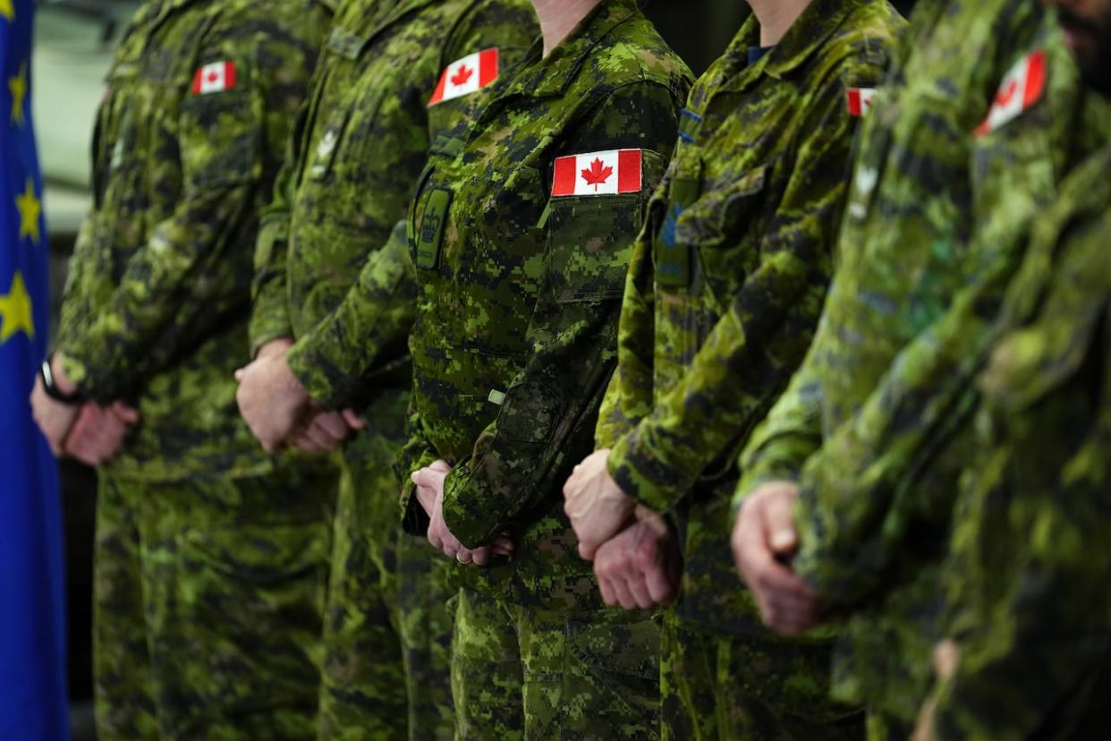 Canadian Forces personnel stand easy at CFB Kingston on March 7, 2023. A senior Canadian Forces officer has been charged with 'conduct to the prejudice of good order and discipline.' (Sean Kilpatrick/The Canadian Press - image credit)