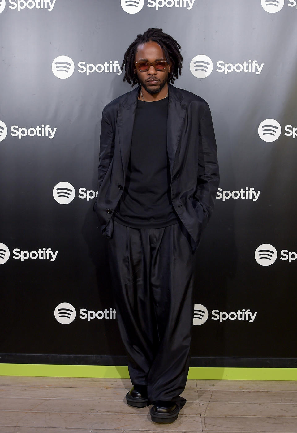 Kendrick Lamar Wearing Drak Clothing And Glasses