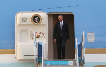 U.S. President Barack Obama disembarks Air Force One after arriving at Antalya International Airport in Antalya, Turkey, for the G20 summit November 15, 2015. REUTERS/Okan Ozer/Pool