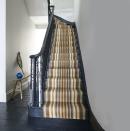 <p>With tones of brown, light blue and yellow, this stair runner from Kersaint Cobb helps to create a natural feel in the home. If you want to create a real statement, why not paint your staircase navy blue? You won't regret it. </p><p>Pictured: Kersaint Cobb, <a href="https://flooringmegastore.co.uk/morocco-runners-kersaint-cobb/" rel="nofollow noopener" target="_blank" data-ylk="slk:Morocco Runner;elm:context_link;itc:0;sec:content-canvas" class="link ">Morocco Runner</a>, Casablanca priced from £68 per linear metre.</p>