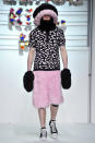 <b>Model, Sibling</b><br><br>Models strutted down the catwalk for the Sibling AW13 fashion show in oversized wooly hats and gloves teamed with feathered baby pink shorts... and Converse.