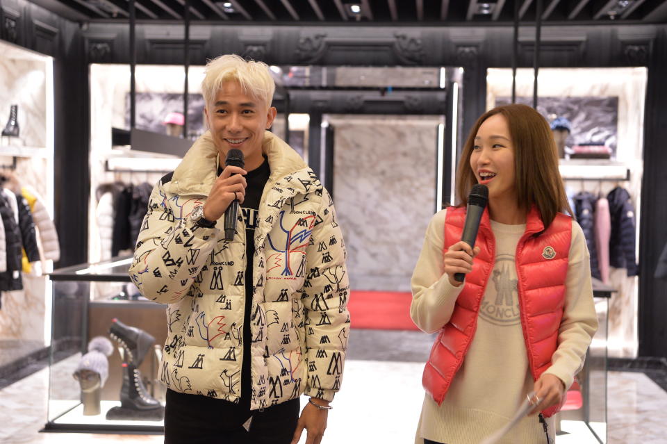 Desmond Tan and Constance Lau dressed in Moncler down jackets