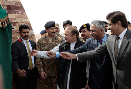 Pakistani Prime Minister Nawaz Sharif (C) attends a ceremony to inaugurate the M9 motorway between Karachi and Hyderabad, near Hyderabad, Pakistan February 3, 2017. REUTERS/Caren Firouz