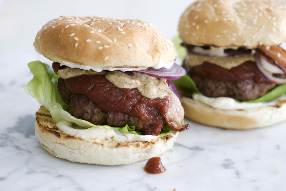 This image taken on April 22, 2013, shows club house burgers with buttered buns in Concord, N.H. (AP Photo/Matthew Mead)