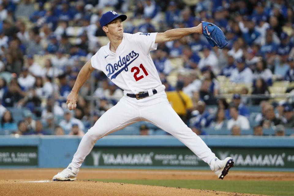 Dodgers starting pitcher Walker Buehler delivers against the Cincinnati Reds in April 2022.