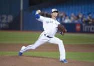 Apr 13, 2019; Toronto, Ontario, CAN; Toronto Blue Jays starting pitcher Clay Buchholz (36) throws a pitch during the first inning against the Tampa Bay Rays at Rogers Centre. Mandatory Credit: Nick Turchiaro-USA TODAY Sports