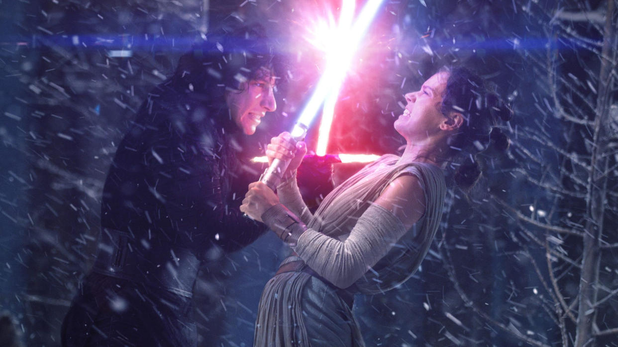 Adam Driver as Kylo Ren and Daisy Ridley as Rey in 'Star Wars: The Force Awakens'.