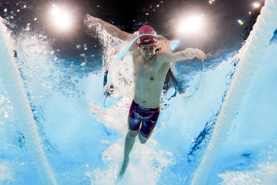 Pan Zhanle of China breaks own world record to win Olympic gold medal