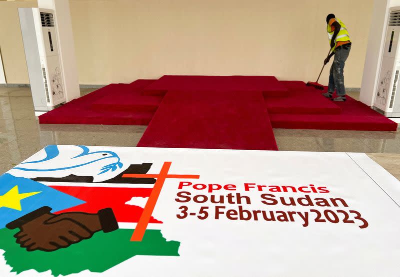 A worker cleans the John Garang Mausoleum ahead of Pope Francis' visit in Juba