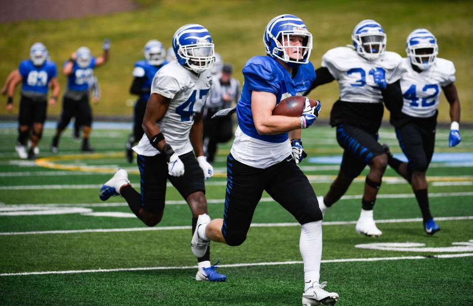 University of Memphis wide receiver Zach Switzer (27) runs with the ball towards the end zone during a game of scrimmage at Centennial high school in Franklin, Tenn., Saturday, April 2, 2022. 