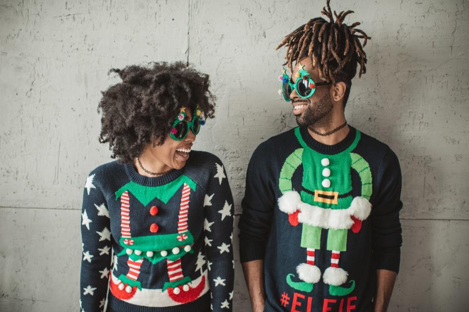 2) Don an ugly Christmas sweater.