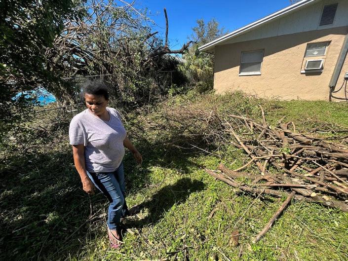 Fort Myers resident Marie Fleurette Radius describes the damage the Fort Myers community suffered after Hurricane Ian on September 30, 2022.