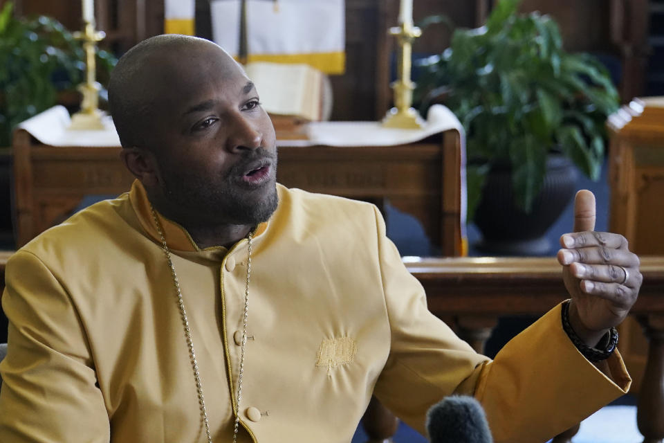 The Rev. Robert Turner, pastor of the Historic Vernon African Methodist Episcopal Church, speaks during an interview at the church in Tulsa, Okla., on Sunday, April 11, 2021. Speaking about the 1921 Tulsa Race Massacre, he says, “What happened in Tulsa wasn’t just unique to Tulsa. This happened all over the country. It was just that Tulsa was the largest. It damaged our community. And we haven’t rebounded since. I think it’s past time that justice be done to atone for that.” (AP Photo/Sue Ogrocki)