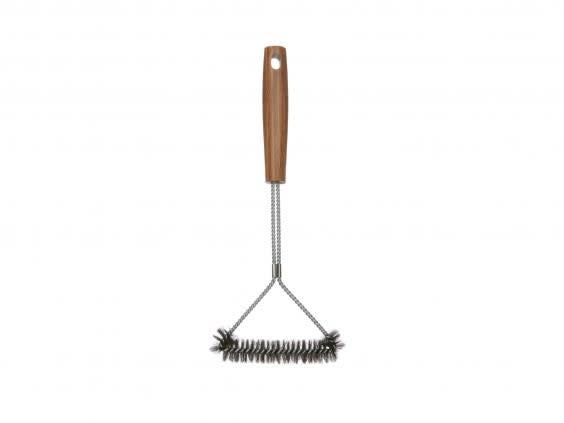 The brass bristle on this BBQ cleaning tool will ensure you won’t be left with charred remains (John Lewis & Partners)