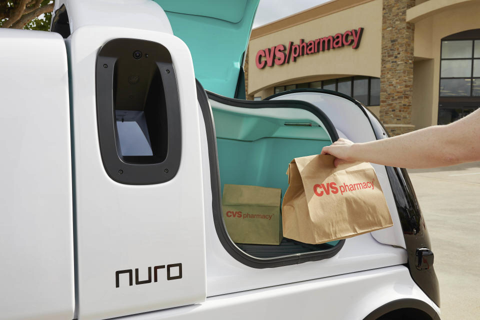 This undated photo provided by Nuro shows a package delivered to a Nuro vehicle. CVS Health said Thursday, May 28, 2020 it will partner with Silicon Valley robotics company Nuro on deliveries of medicines and other products to customers near a Houston-area store/ (Nathan Lindstrom/Nuro via AP)