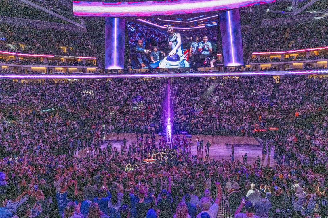 Sacramento Kings center Domantas Sabonis (10) lights the beam as fans cheer at Golden 1 Center after his team defeated the Golden State Warriors during an NBA play-in game on Tuesday, April 16, 2024.