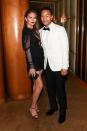 <p>Everyone’s favourite couple combined a white tux with a short mesh dress.<br><i>[Photo: Rex]</i> </p>