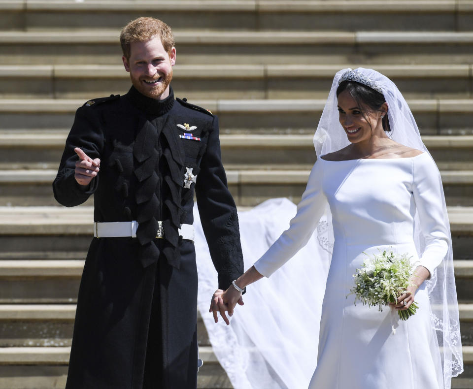 Photo by: KGC-107/STAR MAX/IPx 2018 5/19/18 Prince Harry The Duke of Sussex and Meghan Markle The Duchess of Sussex - man and wife - at their wedding ceremony held at St. George&#39;s Chapel on the grounds of Windsor Castle. (Windsor, England, UK)
