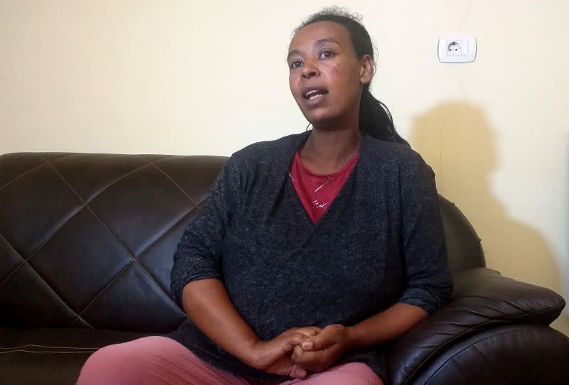 Aselefech Mulatu, wife of Dejene Tafa, a politician who is in custody, talks during a Reuters interview at their home in Oromiya region's Burayu town northwest of Addis Ababa