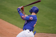 New York Mets' Pete Alonso hits a grand slam during the fifth inning of a spring training baseball game against the Washington Nationals, Thursday, March 4, 2021, in Port St. Lucie, Fla. (AP Photo/Lynne Sladky)