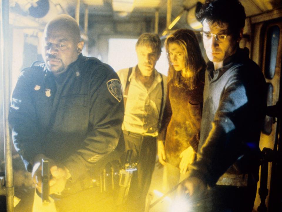 Mira Sorvino, Jeremy Northam, Charles S. Dutton, and Giancarlo Giannini in "Mimic" (1997).
