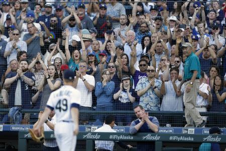 Jun 16, 2018; Seattle, WA, USA; Seattle Mariners starting pitcher Wade LeBlanc (49) receives a standing ovation from the crowd while leaving the game during the eighth inning against the Boston Red Sox at Safeco Field. Mandatory Credit: Jennifer Buchanan-USA TODAY Sports