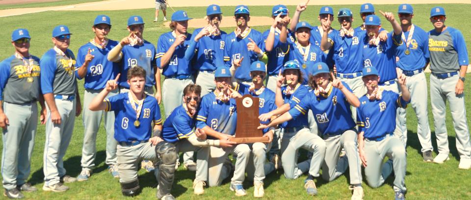 The Clear Spring Blazers pose with the 2022 Maryland Class 1A state championship trophy on May 28.