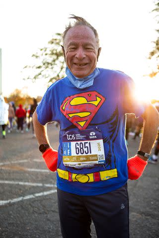 <p>Michelle Farsi/Getty </p> Runner prepares to race in the 2021 TCS New York City Marathon